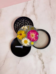 grinder covered in real flowers
